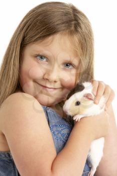 Royalty Free Photo of a Youngster Holding a Guinea Pig