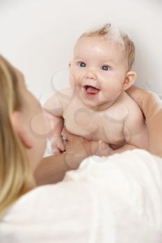 Royalty Free Photo of a Baby Having a Bath