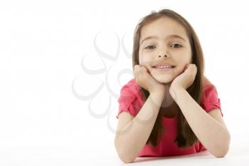 Royalty Free Photo of a Little Girl Lying on Her Stomach