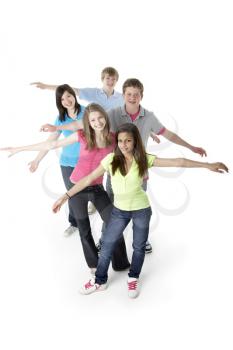 Royalty Free Photo of Students in a Row With Their Arms Outspread