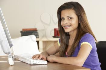Royalty Free Photo of a Girl on the Computer