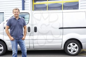 Royalty Free Photo of a Man Next to a Van