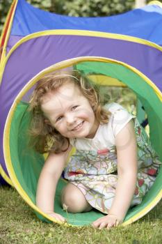 Royalty Free Photo of a Girl in Playground Equipment