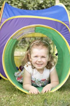 Royalty Free Photo of a Little Girl on a Playground Toy