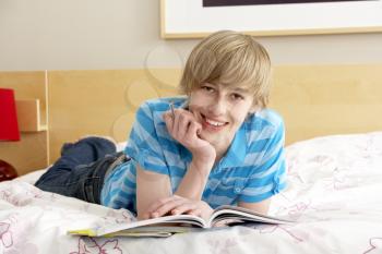 Royalty Free Photo of a Boy With a Journal