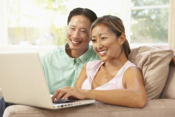 Royalty Free Photo of a Couple With a Computer