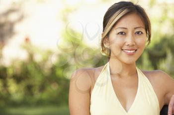 Royalty Free Photo of an Asian Woman Outside