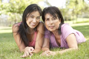 Royalty Free Photo of a Mother and Daughter on the Grass