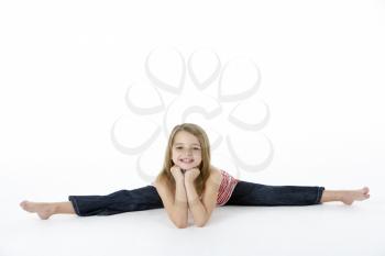 Young Girl In Gymnastic Pose Doing Splits