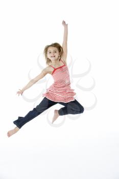 Young Girl Jumping In Mid Air
