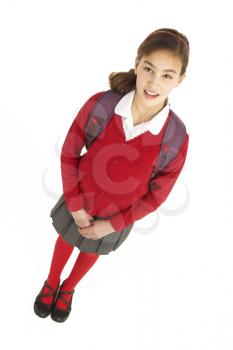 Royalty Free Photo of a Girl With a Backpack in a School Uniform