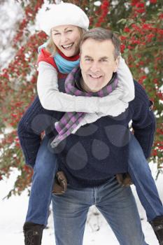 Royalty Free Photo of a Couple Having Fun in Winter