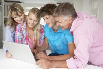 Family using laptop