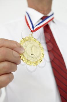 Businessman wearing medal