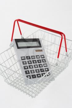 supermarket basket and calculator