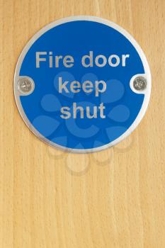 Keep shut sign on fire door