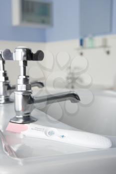 Pregnancy testing kit in bathroom