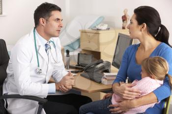 American doctor talking to worried mother