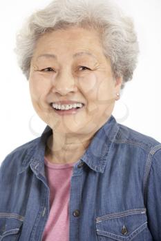 Studio Shot Of Chinese Senior Woman