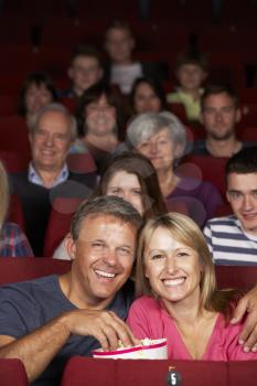 Couple Watching Film In Cinema