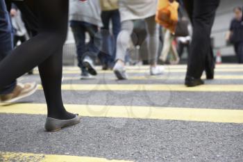 Close Up Of Commuters Feet Crossing Busy Hong Kong Street