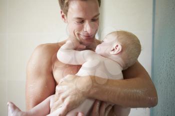 Father Taking Shower With Baby Son