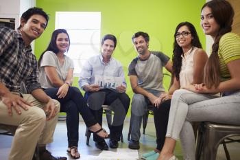Group Of Hispanic Designers Meeting To Discuss New Ideas
