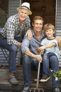 Father, son and grandson on veranda