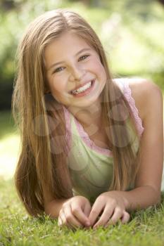 Portrait Of Young Girl Relaxing In Countryside