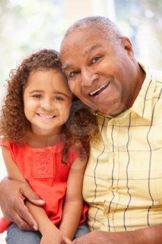 Senior African American man and granddaughter