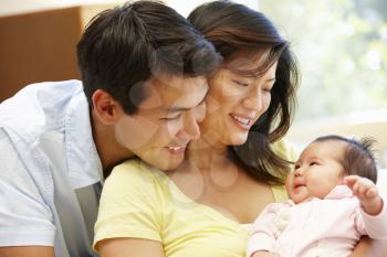 Asian couple and baby
