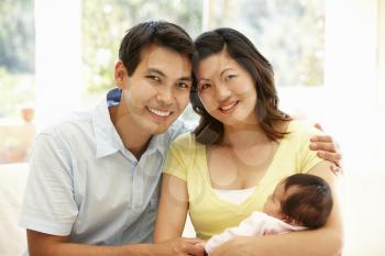 Asian couple with baby