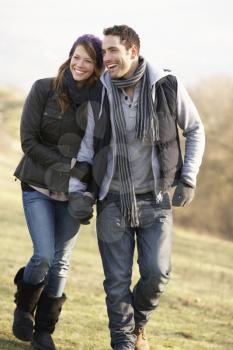 Couple on romantic country walk in winter