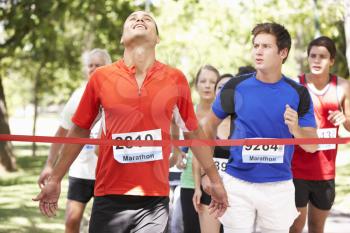 Male Athlete Winning Marathon Race