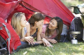 Three Young Women On Camping Holiday Together