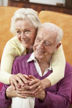 Romantic Senior Couple Relaxing At Home