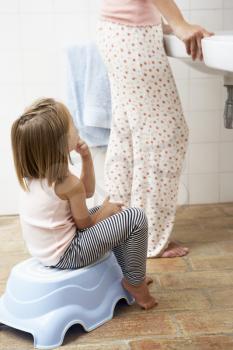 Daughter Reluctant To Brush Teeth With Mother