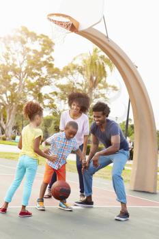 Family Playing Basketball Together