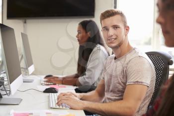 Portrait Of Male University Student Using Online Resources
