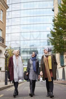 Group Of British Muslim Businesswomen Leaving