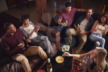 Young adults having a party at home, elevated view