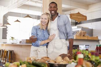Portrait Of Couple Running Organic Food Store Together