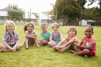 Portrait Of Pupils At Montessori School During Outdoor Break