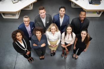 Overhead Portrait Of Business Team Standing In Modern Office