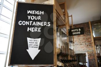 Weigh Your Container Sign In Sustainable Plastic Free Grocery Store