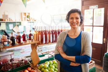 Portrait Of Mature Woman Running Organic Farm Shop