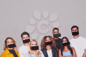 Freedom Of Speech Concept Showing Group Of Young People With Mouths Covered With Tape