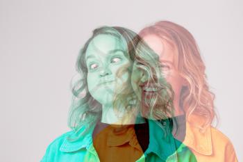 Composite Concept Image Showing Contrasting Emotions On Face Of Young Woman Using Social Media