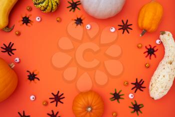 Overhead Halloween Banner Composed Of Pumpkins With Candy Spiders And Eyeballs On Orange Background