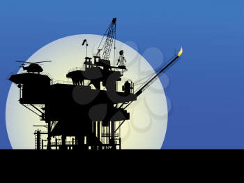 Silhouette of an oil platform in the moon light